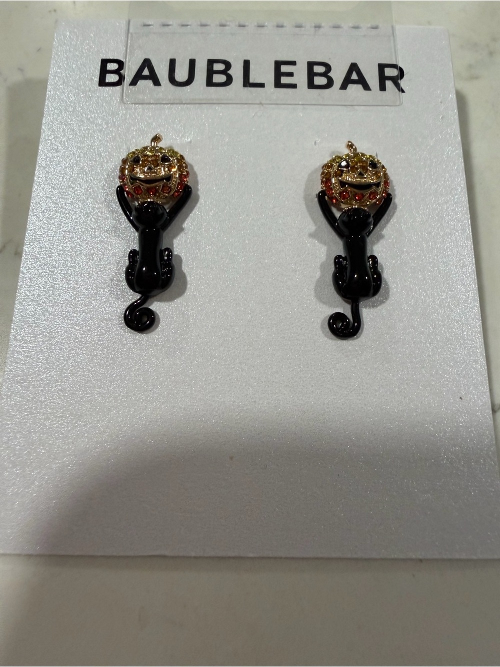 BaubleBar Black Cat Drop Earrings with pumpkin